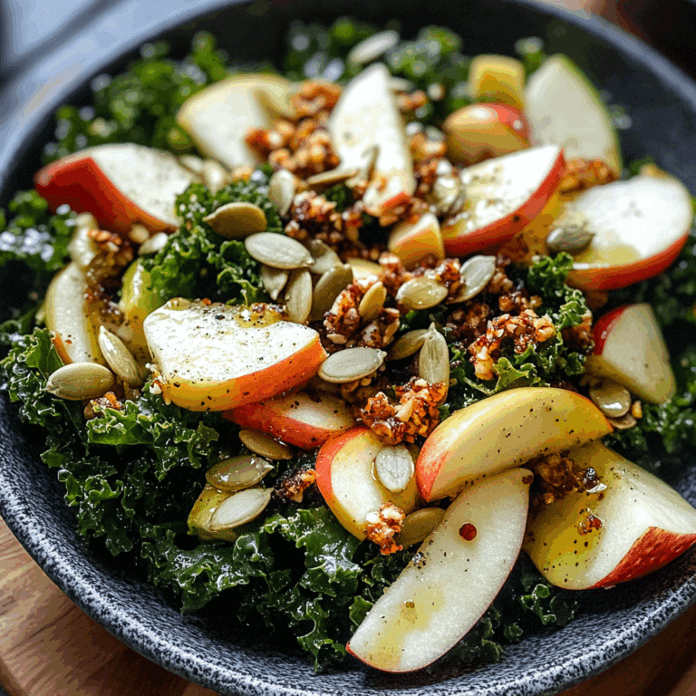 Kale Salad with Apple and pumpkin seed clusters